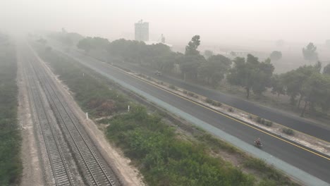Drone-bird-view-over-Sahiwal-to-Multan-Road-in-punjab-it-is-very-foggy