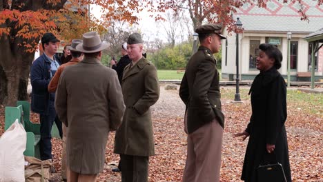 Reenactment-of-a-Group-of-United-states-solders-welcomed-home-from-World-War-II-talk-in-town-square