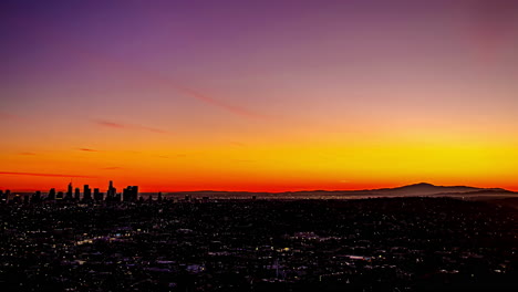 Lapso-De-Tiempo,-Puesta-De-Sol-Y-Noche-Sobre-Los-Angeles-California-Usa,-Cielo-Colorido-Y-Luces-De-La-Ciudad