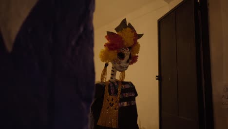 Catrina-dressed-in-typical-regional-costumes-in-Oaxaca,-Mexico