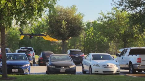 This-is-video-clip-of-a-air-medical-helicopter,-landing-at-a-hospital,-in-Houston,-on-a-summer-afternoon