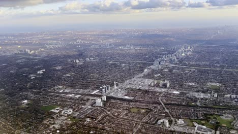 Aerial-panoramic-view-of-Toronto-suburban-area-as-seen-from-airplane-approaching-Pearson-airport,-Ontario-in-Canada