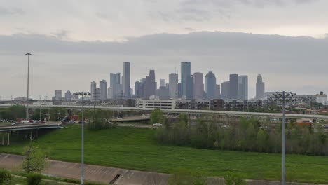 Aerial-shot-of-downtown-Houston,-Texas-from-park-in-the-historic-Heights-area-of-Houston