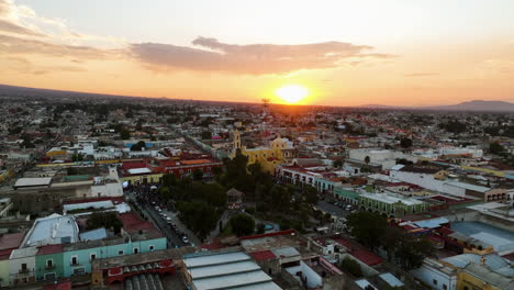 Aerial-view-around-the-Parroquia-de-San-Luis-Obispo,-sunset-in-Huamantla,-Mexico