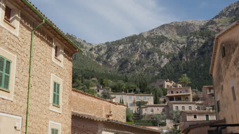 Quaint-village-nestled-in-Mallorcan-mountain-landscape