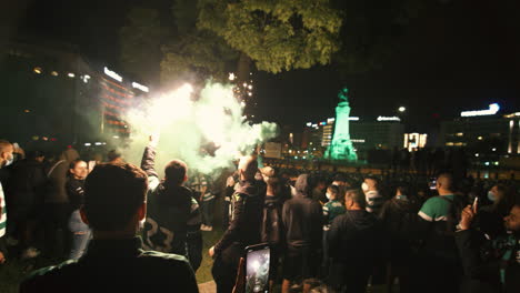 Soccer-fans-playing-with-flares