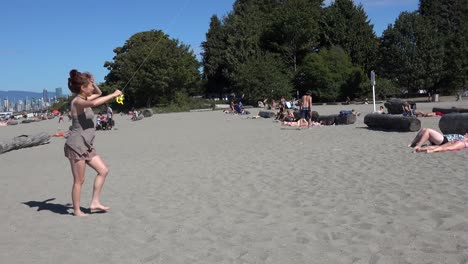 Flying-a-kite-at-a-beach-in-Vancouver