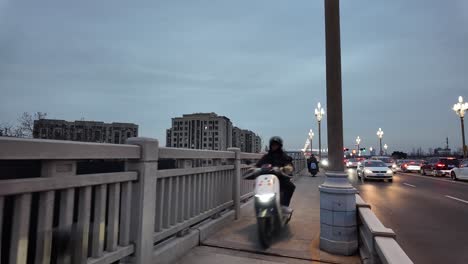 China,-Nanjing,-Baguazhou-Yangtze-River-Bridge---Thrilling-Crossing:-Sharing-the-Bridge-in-Nanjing-with-Pedestrians-and-Motorbikes---An-Authentic-Adventure