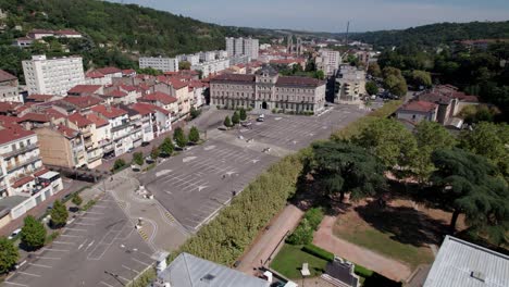 aerial-view-over-Rive-de-Gier-city-hall-in-loire-Department-on-a-sunny-day-in-auvergne-rhone-alpes-region,-France