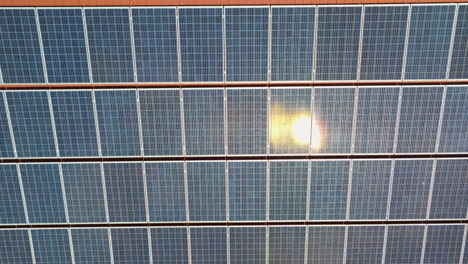 Sun-reflects-on-solar-panels-on-rooftop-of-house