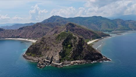 Aerial-View-Of-Cape-Fatucama-With-Cristo-Rei-of-Dili-In-East-Timor