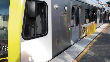 Gold-line-train-pulls-into-the-train-station