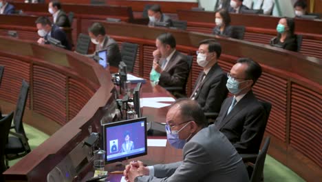 Hong-Kong-lawmakers-attend-Carrie-Lam,-former-Hong-Kong's-chief-executive,-delivering-the-annual-policy-address-at-the-Legislative-Council-building-in-Hong-Kong