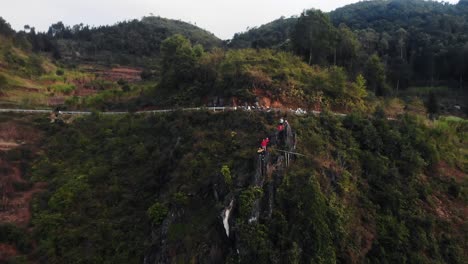 Group-Of-Friends-Standing-On-Hill-In-Ha-Giang-In-Vietnam