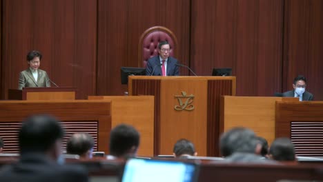 Hong-Kong-lawmakers-listen-to-Carrie-Lam-,-former-Hong-Kong's-chief-executive,-deliver-the-annual-policy-address-at-the-Legislative-Council-building-in-Hong-Kong