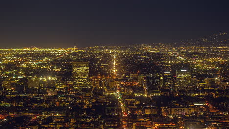 Time-Lapse,-Los-Angeles-Cityscape-and-Night-Traffic,-Shiny-Lights,-Illumination-and-Purple-Sky