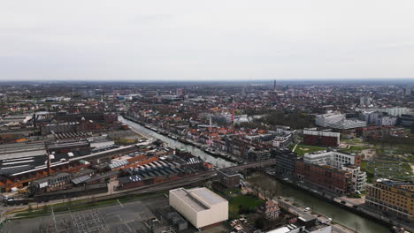 Ghent-city-in-Belgium,-high-angle-drone-view
