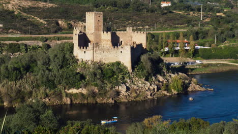 The-majestic-Castle-of-Almourol-on-an-island-in-the-Tagus-River-on-a-bright-sunny-day