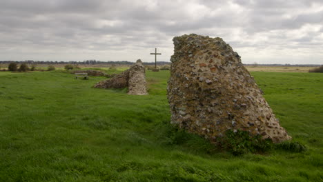 Wide-shot-of-the-ruins-of-St-Benet’s-with-the-cross-of-peace-in-background