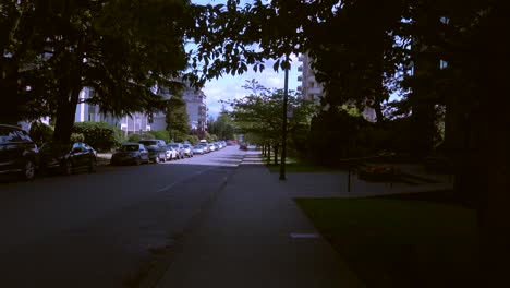 Moving-dolly-shot-on-sidewalk-in-residential-area-of-Vancouver