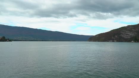 In-glorious-hues-of-sapphire-and-turquoise,-Lake-Annecy's-colour-makes-it-beautifully-striking-and-enticing-for-a-swim