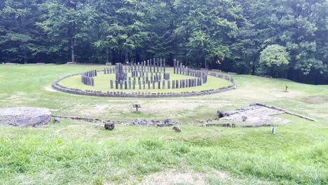 Rising-shot-of-Archaeological-site-Sarmizegetusa-Regia,-the-Great-Circular-Sanctuary