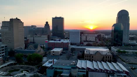 aerial-tilt-up-winston-salem-north-carolina,-nc-skyline