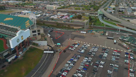 Stadium-seats-are-empty-as-fans-protest-the-sale-of-the-Oakland-Athletics-tailgating-in-the-parking-lot