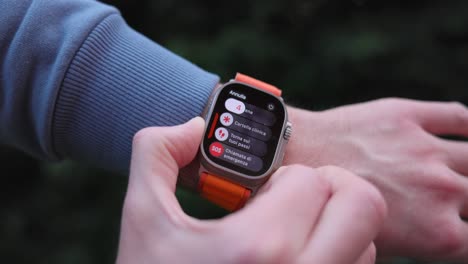 Pressing-Side-Button-On-Apple-Smart-Watch-Ultra-2-On-Wrist