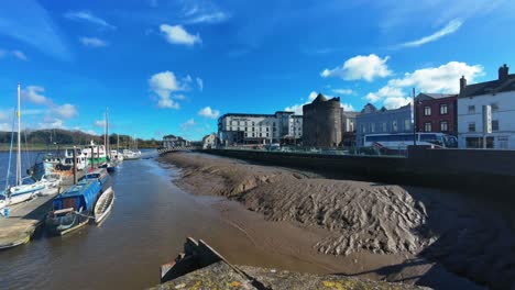 Timelapse-Waterford-City-River-Suir-Viking-Reginald’s-Tower-and-colourful-boats-moored-on-quays