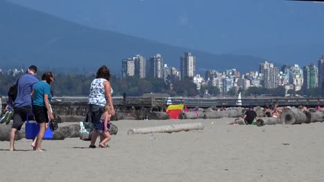 Parents-with-kids-at-a-beach