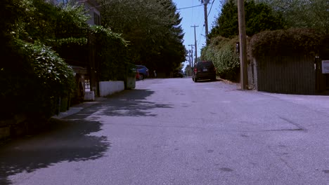 Walking-in-a-back-alley-in-residential-area-on-a-sunny-day