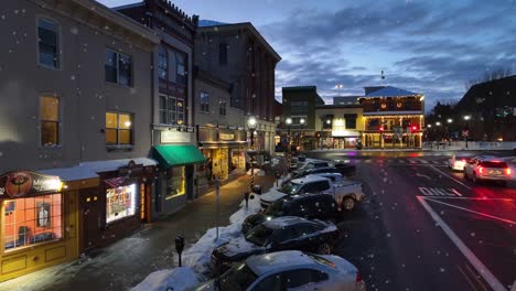 Snow-flurries-in-small-town-in-USA-at-dusk