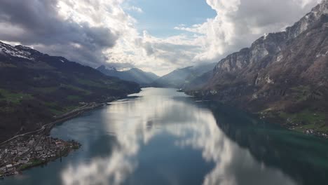 Bird's-eye-view-of-the-vast-Lake-Walensee-in-Wessen-Amden-Quinten-Mols-Walenstadt-Switzerland,-a-paradisiacal-spot-in-Switzerland