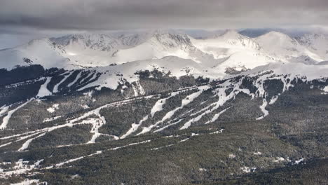 Vail-pass-i70-perspective-of-Copper-Mountain-ski-resort-American-Fyler-Timberline-trail-runs-ten-mile-range-Leadville-Colorado-ikon-Rocky-snowy-winter-spring-snowy-peaks-evening-clouds-forward