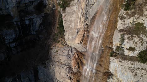 The-rushing-water-over-the-rocks-of-the-Seerenbachfälle-waterfall-located-near-the-village-of-Amden