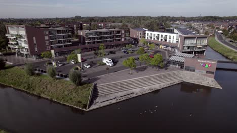 Moated-commercial-part-in-residential-neighbourhood-Leesten