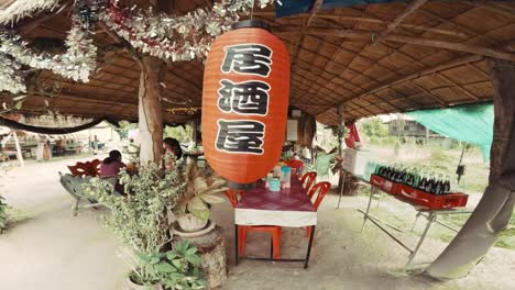 Small-restaurant-in-remote-village-of-Thailand-decorated-with-chines-writing