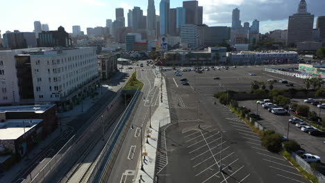 Aerial-view-approaching-the-Little-Tokyo-and-the-skyline-of-Los-Angeles,-USA