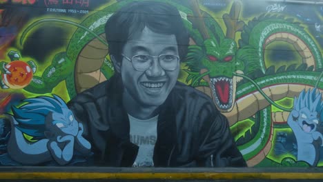 Mural-De-Graffiti-Creado-Por-Un-Grupo-De-Artistas-Dedicado-A-Akira-Toiryama,-El-Fallecido-Creador-De-La-Serie-De-Anime-Dragon-Ball.