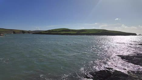 Cold-water-swimming-in-Sandycove,-Kinsale,-Ireland