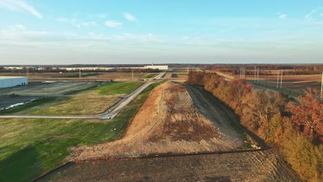 Aerial-reveal-of-Ford's-Megacampus,-BlueOval-City-at-Sunset-in-Stanton,-TN