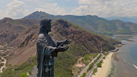 Closeup-Of-Cristo-Rei-of-Dili-Statue-And-The-Beaches-In-Cape-Fatucama,-Dili,-East-Timor