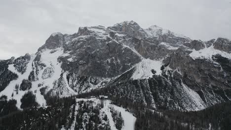 -Icy-altitude-Tofane-mountain-peaks-Cortina-Dolomites-Italian-ski-area-drone-shot
