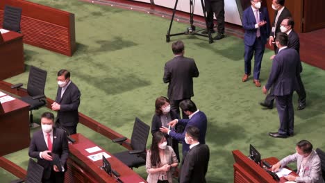 Hong-Kong-lawmakers-arrive-at-the-main-chamber-moments-before-the-arrival-of-the-chief-executive-at-the-Legislative-Council-building-in-Hong-Kong