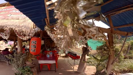 Small-restaurant-in-remote-village-of-Thailand-decorated-with-chines-writing