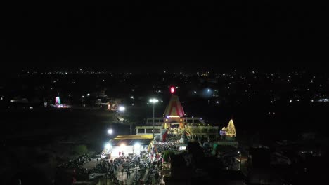 Aerial-drone-view-moving-forward-Many-people-are-going-to-visit-the-temple-in-line