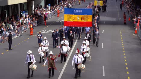 Representatives-from-the-Royal-Australian-Electrical-and-Mechanical-Engineers-RAEME-marching-down-the-street-of-Brisbane-city,-amidst-the-solemnity-of-the-Anzac-Day-commemoration,-close-up-shot