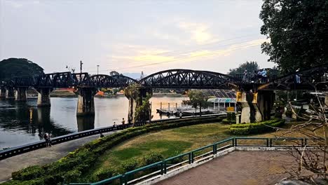 Timelapse-of-the-famous-historical-landmark,-the-Bridge-over-River-Khwae-which-was-built-by-prisoners-of-war-during-the-World-War-II