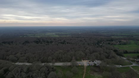 Surreal-Aerials-of-Newlands-Corner-Car-Park-at-Dusk,-Surrey